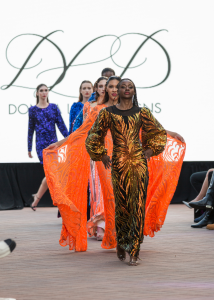 Models on fashion runway.