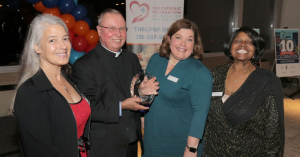 The Catholic Foundation of Greater Philadelphia presents Reverend Monsignor Francis W. Beach with the inaugural Heart of Charity Leadership Award