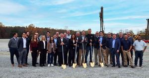 Group of people from 3 Rivers Energy Partners and associates with golden shovels at the official Boston, Kentucky location.