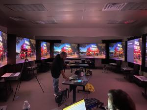 Laser TVs and projector screens side by side