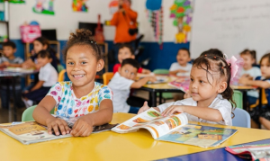 Dinant donated 2,245 school kits to students at risk of dropping out of school.  The kits include a backpack, pens, and notebooks.
