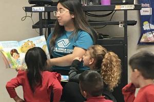 Children being read to during a program run by Boys and Girls Club Sonoma-Marin.