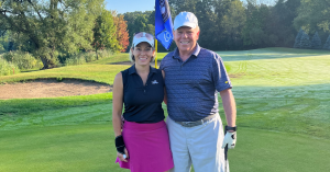 The Farley Group CEOs, past and present, standing on a golf course smiling.