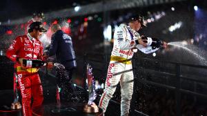 F1 winners spray sparkling wine on podium