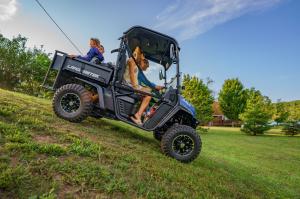 Amp UTV with Flip seat, driving around a lake with family