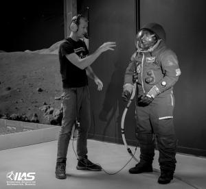 2023 Out Astronaut Contest Winner Issac C. Anderson (right) receiving space suit training with IIAS's Chris Lundeen