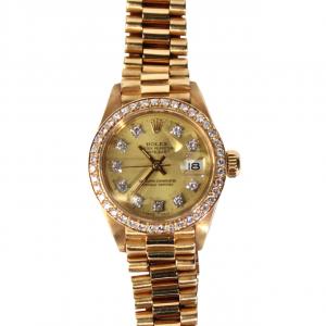 Rolex 18k rose gold and diamond Oyster Perpetual Date ladies’ watch with Presidential band (est. $8,000-$12,000).