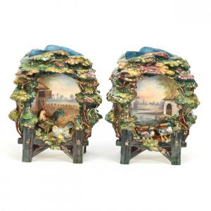 Pair of faience (tin glazed earthenware) pottery vases, featuring two distinct scenes of a Hen House and a Duck House, marked with “E. G.” (for Edward Gilles), 11 ½ inches tall (est. $750-$1,500).