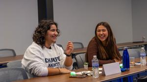 Two students share a laugh during job shadowing program