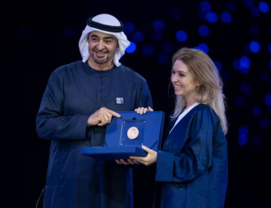 Angela Homsi, Ignite Power's President, receives the Zayed Prize by His Highness Sheikh Mohamed bin Zayed Al Nahyan, President of the UAE