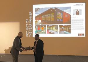 PBK Architects accepting the "Project of the Year" award.