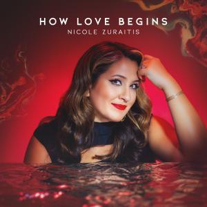 album cover featuring a smiling woman on bright red background