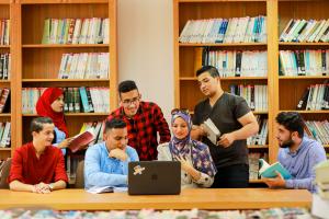 Students from Education Above All's Al Fakhoora program, once gathered in their now-destroyed Gaza library, reflect a lost era of peace. EAA, in partnership with UN agencies, has committed $9M to address the escalating educational and humanitarian crisis in Gaza.