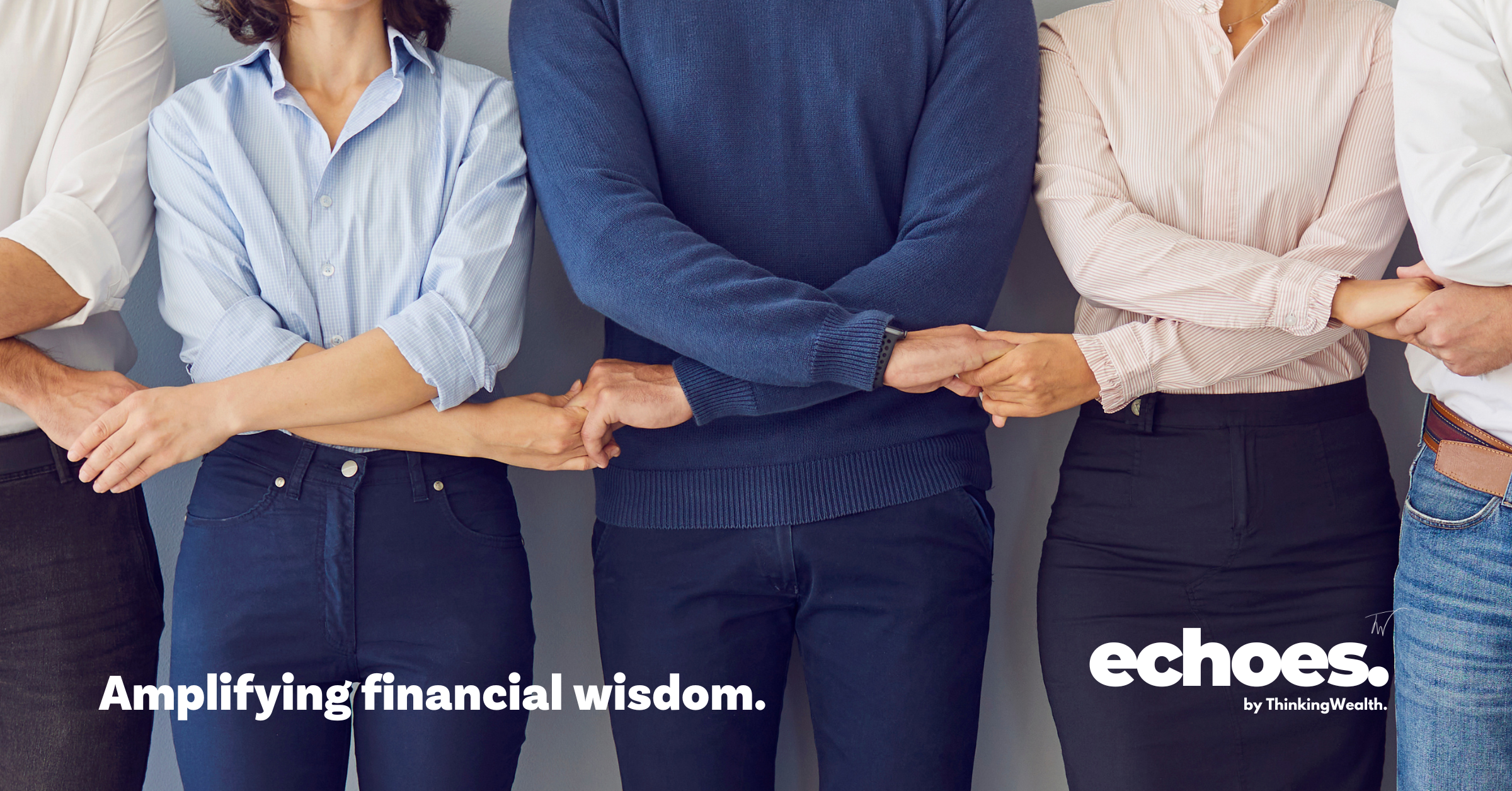 Am image of 4 woman and men standing in alternate holding hands signifying collaboration and inclusion