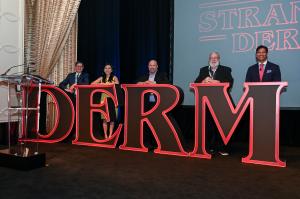 DERM2023 Faculty Posed with a DERM Sign