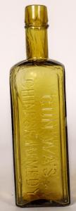 Gun Wa's Chinese Remedy pint bottle, light green (“Warranted / Entirely Vegetable / And Harmless”), whittled with lots of bubbles (est. $1,200-$3,000).