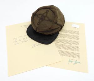 Confederate officer’s kepi (cap with a flat circular top and a peak) picked up at Gettysburg, with Confederate newspaper sewn into the pasteboard crown (est. $15,000-$20,000).