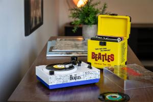 The 1964 Beatles Mini 3 Inch Turntable with records and carrying case