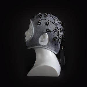 Image of a cap with electrodes connected to it. Caption reads: •	BrainAccess Extended+ Kit, a 32 channel/electrode EEG system, has been added to the existing solution list.