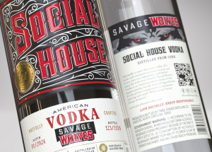 Bottle of Social House Vodka adorned with the emblem of Savage Wolves, supporting NC State University athletes.