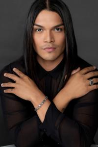 Image of Native American singer Spencer Battiest with arms crossed