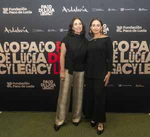 Family members of Paco de Lucia, widow Gabriela Canseco and daughter Antonia de Lucia standing in front of step and repeat at opening night reception at Carnegie Hall