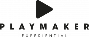 Playmaker Experiential logo in black against a white background, featuring a play button stacked with bold lettering the spelling out PLAYMAKER centered below it, with thinner and smaller text centered at the bottom spelling out EXPERIENTIAL