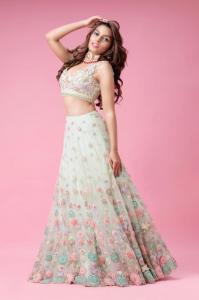 Young lady in modern India two-piece cream floral dress.