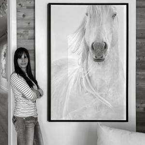 Photographer Maria Marriott with her artwork, Tango