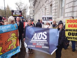 Infected Blood Victims Holding AIDS Banner