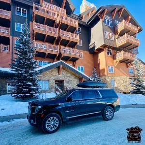Avo Limo SUV In Front of Vail resorts