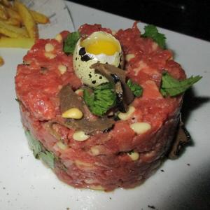 Steak tartare is one of those raw foods that if prepared without proper hygienic techiques could lead to infection or food poisoning. License: Creative Commons