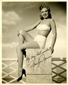 PSA/DNA graded 10 vintage black and white pin-up photograph of Marilyn Monroe, taken circa 1947, the first known instance of her signing a photo as “Marilyn Monroe,” using her recently adopted stage name (est. $28,000-$35,000).