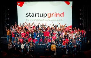 Chapter Directors from around the world pose for a photo together on the main stage at Startup Grind Global.