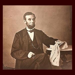A sepia portrait of Lincoln posing with the Sunday Morning Chronicle.