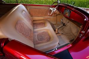 the stunning tan leather interior of a 1932 Ford