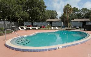 A beautiful pool sits in the center of the property for residents to enjoy.