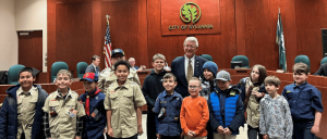 City of Sylvania Mayor with a group of young boy scouts.