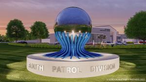 Gordon Huether's glass, mirror-finish stainless steel sphere at the heart of the 11-foot 8-inch tall sculpture entitled, "Vision" at the Fort Worth Police Dept South Division - Image 1
