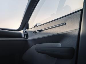 Interior shot of Volvo EX30 dashboard and door trim made of Bcomp's nature fibre composites