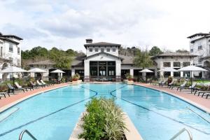 The resort-style pool sits in the center of the property for residents to enjoy.