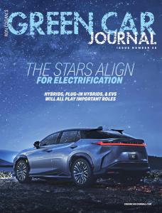 Blue electric car shown against a starry sky.