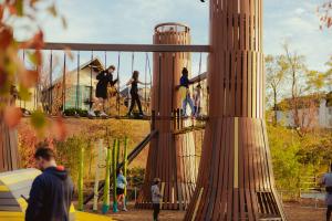 Children enjoy the Life on the River playground, which was inspired by the Mississippi River