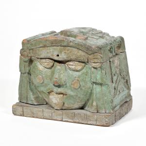 Unusual folk art polychrome carved box found in a Chappaqua, New York home from the late 19th or early 20th century, heavily carved with Aztec devices and faces in relief (est. $200-$400).
