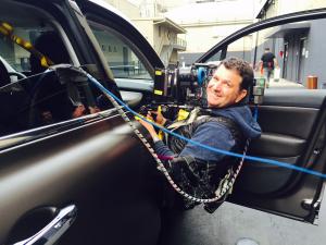 Hollywood Cinematographer Eric Zimmerman shooting in a moving automobile rig