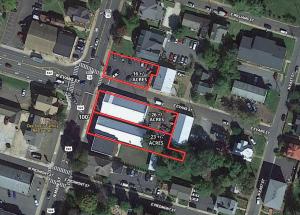  2 commercial buildings on a .49± acre corner lot and a 16 space asphalt parking lot on corner main street lots in downtown Culpeper, V