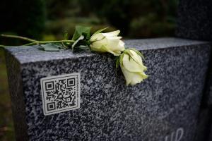 Silver Our Tributes QR Code Memorial Plaque on a Headstone