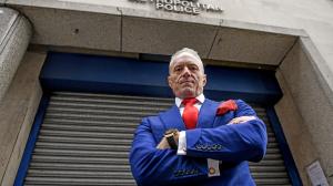 Brian Rose, founder of the London Real Party, stands outside of Shoreditch's closed police station