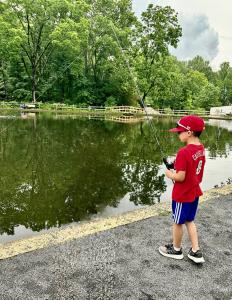 Little boy fishing in a Pennsylvania Park