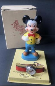 Circa 1960s Ingersoll Disney Works Mickey Mouse wristwatch with original packaging and including an original plastic statuette of Mickey. It winds and ticks! (est. $500-$750).